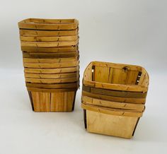 several wooden baskets stacked on top of each other