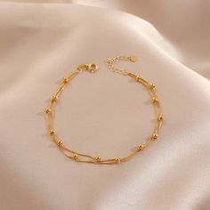 Name: Double layer small round bead bracelet Size: 15+5cm Material: titanium steel Weight: 5 grams Color: gold Product maintenance: Keep away from chemicals, avoid scratches, do not wear in contact with water, do not wear while sleeping, seal and store, do not put together with anti-oxidation paper Regarding color difference: Each picture is taken from the actual object. Due to various reasons such as computer monitor restoration, shooting background, light angle, etc., the color you see in the Gold Bracelet Simple, Jewelry Product Shots, Background Light, Jewelry Set Design, Bracelets Design, Gold Necklace Indian Bridal Jewelry, Dress Indian, Gold Jewelry Simple, Gold Bracelet For Women