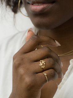 Uniquely organic and intricately detailed, our Olive Leaf ring is crafted in solid 14K gold and features an open wrap design that highlights olive leaves on each end, creating an eye-catching accessory. Nature-inspired Yellow Gold Open Ring Jewelry, 14k Gold Nature-inspired Ring, Olive Leaf Ring, Olive Leaf, Leaf Ring, Solid Gold Rings, Jewelry Cleaner, Exquisite Jewelry, Solid Gold