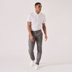 "Introducing our versatile Regular Fit Stretch Chino Trouser in a stylish shade of grey! Crafted with both comfort and style in mind, these trousers are designed to fit you perfectly. The regular fit provides a relaxed yet polished look, while the stretch fabric ensures easy movement throughout the day. Whether you're heading to the office or a casual weekend outing, these chinos are your go-to choice. With their timeless color, they can be effortlessly paired with any outfit to elevate your style. Upgrade your wardrobe with these grey chinos that combine a comfortable fit with a touch of sophistication. Product Features: Grey Stretch Fabric Regular Chino fit Tonal buttons Welt pockets to back 98% cotton 2% spandex Our Model is 5'11\" and wears size 32. To find the perfect fit for yourself Men Gray Pants Outfit, Grey Pants Outfit Men, Grey Chinos Men, Trousers Outfit Men, Grey Chino, Grey Pants Outfit, Grey Pants Men, Grey Chino Pants, Mens Business Casual Outfits