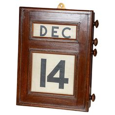 A superb 20th Century perpetual desk calendar, made from mahogany. Featuring four knobs on one side, these are used to move forward and rewind the day and date behind three glazed apertures. On the rear, an attachment to hang the calendar on the wall. A real conversation piece and a superb piece of history reminiscent of the gone by era. CONDITION In Great Condition - Wear expected with age. Please refer to photographs. SIZE Height: 31 cm // 12.2 in Width: 24 cm // 9.45 in Depth: 6.5 cm // 2.56 in Perpetual Desk Calendar, Desk Set, Desk Calendars, Desk Accessories, Conversation Piece, Decorative Objects, 20th Century, Desk, History