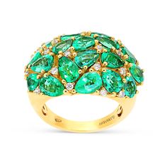 Make a fashion statement with our pear shaped, green emerald, dome ring. Hand crafted with 18K yellow gold, this ring features a pear shaped emerald cluster dome, showcasing various shades of green with small miniature diamonds. The perfect gift for a woman who enjoys standing out in a crowd with unique designer jewelry pieces. Available in all sizes. Send us yours! Emerald Earrings Drop, Green Emerald Ring, Cushion Cut Ring, Dome Ring, Ring Hand, Orange Sapphire, Unique Jewelry Designs, Domed Ring, Tennis Bracelet Diamond