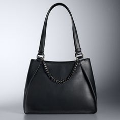 Add a touch of refinement to your look with this modern handbag from Simply Vera Vera Wang. Add a touch of refinement to your look with this modern handbag from Simply Vera Vera Wang. DETAILS 10"H x 14"W x 5.25"D Handle: 12'' drop Strap length: 12" Zipper closure and magnetic snap closure Gunmetal hardware 2 front slip pockets, 1 back zip pockets, 1 zip center divider, 2 front slip pockets, 1 back zip pocket, 1 zip center dividerCONSTRUCTION & CARE PU Lining: polyester Wipe clean Imported Size: Evening Shoulder Bag With Metal Hardware And Double Handle, Modern Tote Satchel With Chain Strap, Modern Satchel With Chain Strap, Modern Satchel With Chain Strap Tote, Modern Evening Tote Shoulder Bag, Classic Bag With Chain Strap And Double Handle, Elegant Formal Bags With Metal Hardware, Modern Tote Bag With Chain Strap, Evening Bags With Metal Hardware And Double Handle