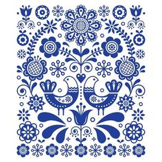 blue and white floral ornament with birds in the center on a white background