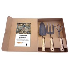 an open box with utensils in it