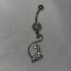 a black and white photo of a giraffe belly ring