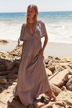 Forever free and flowy, this effortless maxi dress from our free-est collection is featured in a V-neck, tiered silhouette with flutter sleeves for added shape. * Soft, textured fabrication * Elastic empire waist * Effortless, pull-on style | La La Maxi Dress by free-est at Free People in Grey, Size: L Flowy Outfits, Fall Maxi, Free People Maxi, Free People Maxi Dress, Short Sleeve Maxi Dresses, Wardrobe Inspiration, Satin Midi Dress, Senior Pics, Boho Maxi