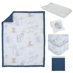 baby bedding set with blue and white sheets, blanket, bib and pillow