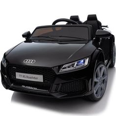 a black toy car is shown on a white background