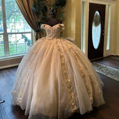 a dress on display in front of a window