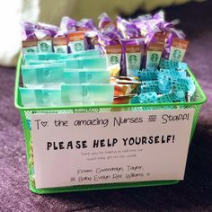 a container filled with lots of money sitting on top of a purple carpeted floor