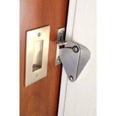 a door handle on a wooden door