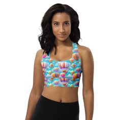 **LADIES: For sizing reference, I am a 38DDD/40DD. The size Large fits me tight, and the XL is a tad loose, depending on where I am with my monthly cycle. Upgrade your activewear with this All-Over-Print Longline Sports Bra! 🏋️♀️ Designed for intense workouts and chic streetwear, it offers premium support and style. Perfect for yoga, running, cycling, and more, this sports bra pairs seamlessly with matching leggings. Enjoy the super-soft compression fabric that hugs your body and keeps you secure during medium to high-intensity workouts. With over 300 vibrant designs, you'll stand out in any gym or outdoor setting. Key features:   👚 **74% recycled polyester, 26% elastane**   💪 **Double-layered front** for extra support   🌞 **UPF 50 for sun protection   👙 **Removable padding** and mesh Casual Multicolor Moisture-wicking Sports Bra, Fitted Multicolor Sporty Sports Bra, Multicolor Fitted Moisture-wicking Sports Bra, Sporty Fitted Multicolor Sports Bra, Multicolor Fitted Sports Bra, Fitted Multicolor Sports Bra For Yoga, Multicolor Moisture-wicking Racerback Activewear, Multicolor Fitted Sports Bra For Yoga, Multicolor Moisture-wicking Sports Bra For Workout