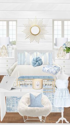 a white bedroom with blue and gold accents on the walls, bedding and pillows