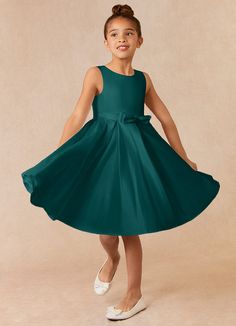 Complete your bridal party with our clean modern Matte Satin flower girl dress, Coco. Her scoop neckline is complimented by a belt with a bow at the front. The skirt is pleated beautifully to flare as she walks down the aisle. This dress is not only perfect for a flower girl at a wedding but also versatile enough for other special occasions. Peacock Flower Girl Dress, Turquoise Flower Girl Dress, Satin Flower Girl Dresses, Purple Flower Girl Dress, Peacock Flower, Girl Green Dress, Teal Bridesmaid Dresses, Satin Flower Girl Dress, Kids Wear Girls