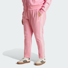 adidas Shop the Adicolor SST Track Pants (Plus Size) - Pink at adidas.com/us! See all the styles and colors of Adicolor SST Track Pants (Plus Size) - Pink at the official adidas online shop. Adidas Loungewear Bottoms, Adidas Sporty Relaxed Fit Pants, Adidas Relaxed Fit Sports Pants, Sportswear Bottoms With Three Stripes Branding For Jogging, Sporty Lounge Pants With Three Stripes, Sporty Loungewear Pants With Three Stripes, Spring Sportswear Bottoms With Side Stripes, Adidas Jogging Pants With Three Stripes, Adidas Sporty Joggers