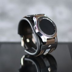 Black Round Watch With Bracelet Strap, Black Leather Strap Watch, Black Cuff Bracelet Watch Band, Black Cuff Bracelet Strap Watch Accessories, Black Round Bracelet Strap Watch, Modern Cuff Watch Band With Bracelet Strap, Silver Watches With Adjustable Black Band, Silver Watch Band With Stainless Steel Clasp For Everyday, Silver Watch Bands With Stainless Steel Clasp