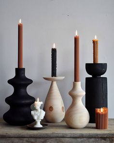 there are many different types of candles on the table