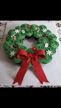 a cupcake decorated like a christmas wreath