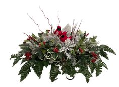 a christmas arrangement with red and white flowers