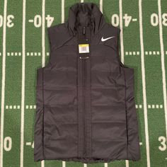 Nike Women's Essential Filled Puffer Vest Jacket Charcoal AQ3568-060 Sz S $100. Shipped USPS Priority Mail. Check out my other listings for great deals. Nike Functional Puffer Jacket For Fall, Nike Functional Fall Puffer Jacket, Functional Nike Puffer Jacket For Fall, Nike Black Puffer Jacket For Fall, Puffer Vest, Women Essentials, Brands Outlet, Vest Jacket, Nike Women