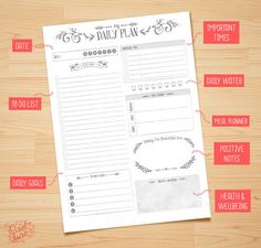 the daily planner printable is on top of a wooden table with other things to do