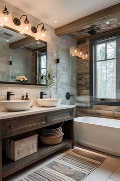 a bathroom with two sinks and a bathtub