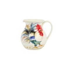 a white pitcher with a rooster painted on it