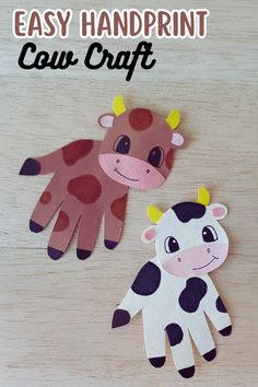 an easy handprint cow craft for toddlers to make with paper and construction materials