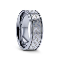 a wedding band with an intricate design inlaying the center, and engraved on the inside