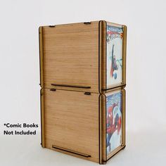 an image of a wooden refrigerator with comic books on the front and bottom doors open