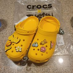 Crocs X Justin Bieber Drew House Yellow Classic Clogs Women's Size 9 Nwt Yellow Synthetic Mules With Round Toe, Yellow Flat Casual Mules, Yellow Synthetic Clogs With Round Toe, Yellow Synthetic Clogs With Rubber Sole, Yellow Closed Toe Synthetic Clogs, Yellow Synthetic Closed Toe Clogs, Yellow Crocs, Drew House, Shoes Crocs