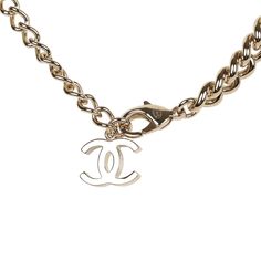 This Chanel necklace is in light gold tone metal with a rhinestone filled star, imitation wax seal stamped CC pendant, and a lobster claw clasp closure. Origin: Italy Condition: New and never worn Accompanied by: Chanel box, pouch, carebook, ribbon, and retail UPC Measurements: 14.75" chain Wax Seal Logo, Chanel Box, Box Pouch, Star Necklace Gold, Chanel Necklace, Seal Logo, Quality Handbags, Wax Seal Stamp, Seal Stamp