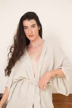 Classic kimono robe handmade with an all-natural luxurious and textured linen gauze. ONE SIZE Linen Wrap Robe For The Beach, Linen Wrap Robe For Beach, Spring Loungewear Kimono With Natural Dye, Linen Kimono With Kimono Sleeves For Loungewear, Linen Wrap Kimono For Vacation, Beige Linen Kimono For Beach, Vacation Linen Wrap Kimono, Beige Linen Beach Kimono, Linen Kimono With Kimono Sleeves For Vacation