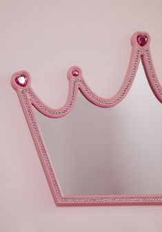 cuz you're a vision! This mirror is shaped like a tiara, outlined with gemstones, heart shaped pink gemstone detailing, is moisture proof, has attached metal hangers, and comes with screws and bolts. Dolls Kill Outfits, Festival Shop, Doll Home, Screws And Bolts, Pride Outfit, Girly Accessories, Metal Hangers, Pink Gemstones, Exterior Decor