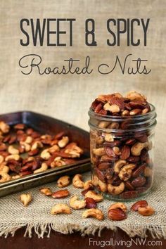 sweet and spicy roasted nuts in a glass jar next to a baking pan with the title