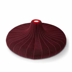 a round object with a red light on it