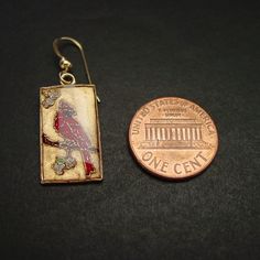 "Hand carved cloisonne bird cardinal earrings ( oiseau, vogel). One of our most popular birds, the Cardinal is the official state bird of no fewer than seven eastern states. Abundant in the Southeast, it has been extending its range northward for decades, and it now brightens winter days with its color and its whistled song as far north as southeastern Canada. Feeders stocked with sunflower seeds may have aided its northward spread. The cardinal bird is also known for representing celebration, r Cardinal Beaded Earrings, Cardinal Earrings, Cardinal Keychain, Bird Earrings Gold, Bird Cardinal, Leo Necklace Zodiac, Silver Bird-shaped Jewelry For Gift, Tarpon Springs, Cardinal Bird