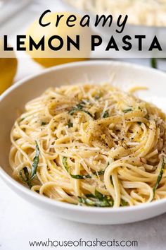 a white bowl filled with lemon pasta