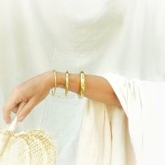 "Pure Simplicity, Pure solid brass Bangles Set Handmade 2.5\" Dia Arrives in logo drawstring protective pouch" Brass Bangle Bracelet For Everyday Wear, Everyday Stackable Bangle, Handmade Minimalist Brass Bangle, Minimalist Handmade Brass Bangle, Minimalist Everyday Brass Bangle, Everyday Minimalist Brass Bangle, Everyday Bohemian Bracelet Bangle, Bohemian Cuff Bracelet Bangle For Everyday, Bohemian Bangle Cuff Bracelet For Everyday