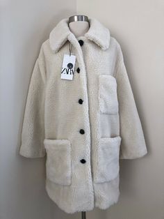 Zara Womens Sherpa Fleece Teddy Bear Coat Size L Color: Ecru White . Condition is New with tags. Shipped with USPS Priority Mail. SMOKE AND PET FREE HOME RETURNS: The buyer MUST notify within 3 days after receiving the item if a return is desired. The item must be shipped within that 30 day period. Item must be in same condition as received (all tags attached, must be in new, unworn condition). Upon receipt of the item and confirmation of its condition, we will issue a purchase price refund minu Cozy Cream Outerwear With Pockets, Cozy Beige Zara Outerwear, Cozy Off White Outerwear For Fall, Zara Oversized Cream Outerwear, Cozy White Outerwear With Button Closure, Teddy Bear Coat, Bear Coat, Womens Sherpa, Zara Jacket