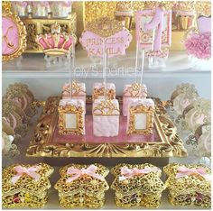 pink and gold princess themed birthday party with cupcakes, cakes and cookies on display