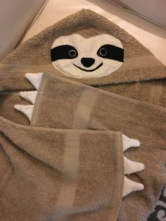 a towel with a slot face on it