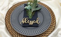 a table setting with a plate, napkin and flower arrangement on it that says'messed '