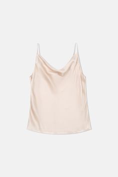 This graceful silk cowl neck camisole is made with premium mulberry silk. Adjustable shoulder strap allows you to tailor the neckline to your fitting. Style #: WWSH906