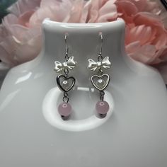 Handmade Heart Earrings with glass bead. - 925 Sterling Silver Hooks with a plastic stopper. - Aprox 4cm drop. - Please note all earrings are handmade therefore may be slightly different!  - For hygiene reasons, all earrings are non refundable/exchangeable. Please contact if you have any issues with your order. Socials: Instagram: https://www.instagram.com/curephie/ TikTok: https://www.tiktok.com/@curephie Cute Heart Beads Dangle Jewelry, Dangle Heart Bead Earrings Gift, Heart Beads Drop Earrings For Gift, Sterling Silver Heart Beads Dangle Earrings, Pink Heart Beads Sterling Silver Earrings, Silver Double Heart Bead Earrings, Pink Sterling Silver Heart Bead Earrings, Silver Double Heart Earrings With Heart Beads, Pink Sterling Silver Heart Beaded Earrings