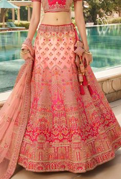 Designer heavy embroidered Bridal Lehenga Choli. Beauty personified. LEHENGA FABRIC: Heavy Satin Silk BLOUSE FABRIC: Heavy Satin Silk DUPATTA: Heavy Net COLOR: Pink SIZE: upto 42 inches Bust and Waist WORK: Heavy Embroidery & Stone Work Bonus offer - Receive a free mystery gift with your order. Stitching Option - We will email you the measurement guide to confirm your size. SHIPPING: The product will be shipped within 1 - 2 weeks from the date of purchase. Product is returnable if un-Stitche Pink Indian Wedding, Pink Bridal Lehenga, Indian Bridal Lehenga, Lehenga Online, Net Lehenga, Party Wear Lehenga, Heavy Embroidery, Bridal Lehenga Choli, Designer Lehenga Choli