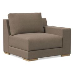 the armless chair is upholstered and has a wooden base, with a light brown