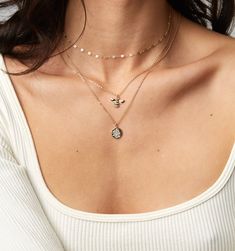 Meet this beautiful dainty bar chain: a fine new addition to your jewelry repertoire.  What sets this necklace apart is the way its delicate links catch and reflect light, creating a captivating sparkle as you move. We have this available in gold filled, sterling silver, and rose gold filled.
Tip: this necklace also comes with a 2" extender so you can adjust the length to sit on your collar bone.
Adjustable length: 15" - 17" Dainty Rose Gold Layered Clavicle Necklace, Dainty Rose Gold Layered Necklace With Clavicle Chain, Rose Gold Jewelry With Delicate Chain For Layering, Dainty Silver 14k Gold Filled Chain Necklace, Dainty 14k Gold-filled Silver Chain Necklace, Silver Dainty 14k Gold Filled Chain Necklace, Rose Gold Clavicle Chain Jewelry For Layering, Dainty Rose Gold Necklace With Figaro Chain, Dainty Rose Gold Chain Necklace For Layering