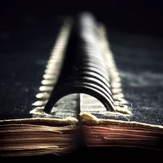 an open book sitting on top of a table